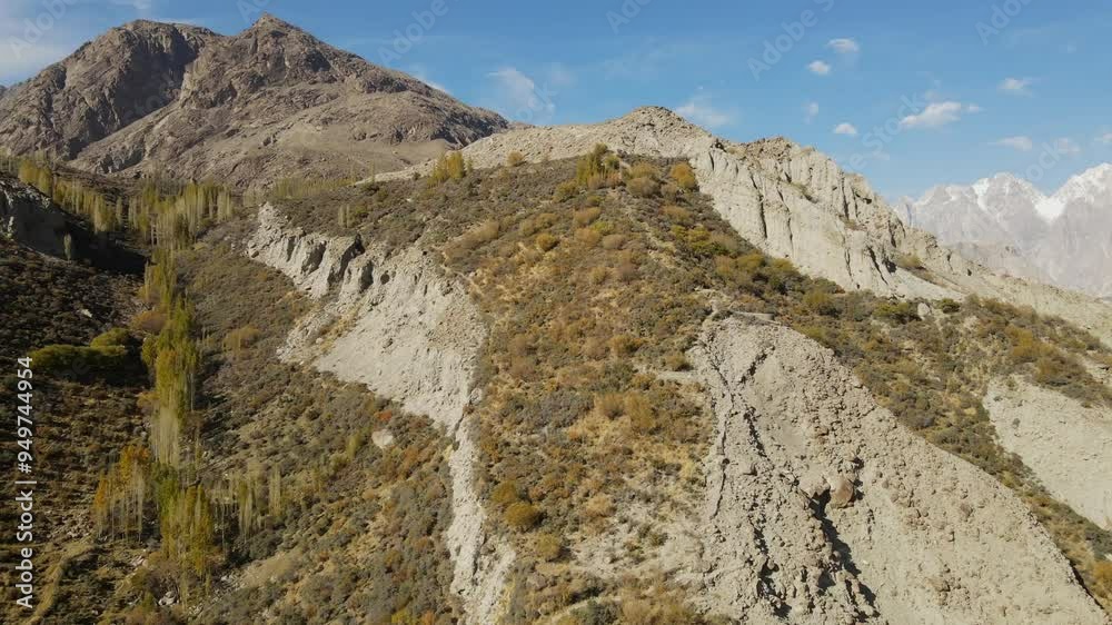 Aerial view of the majestic mountain range and serene Gojal valley, Passu, Pakistan. Aerial view of the majestic mountain range and serene Gojal valley, Passu, Pakistan.