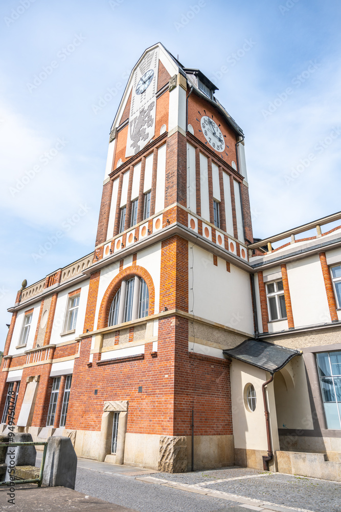 Fototapeta premium The hydroelectric power station Hucak in Hradec Kralove features stunning Art Nouveau architecture, showcasing intricate design and historical significance in Czechia's energy landscape.