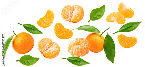 flying mandarins with green leaves and slices isolated on white background. clipping path