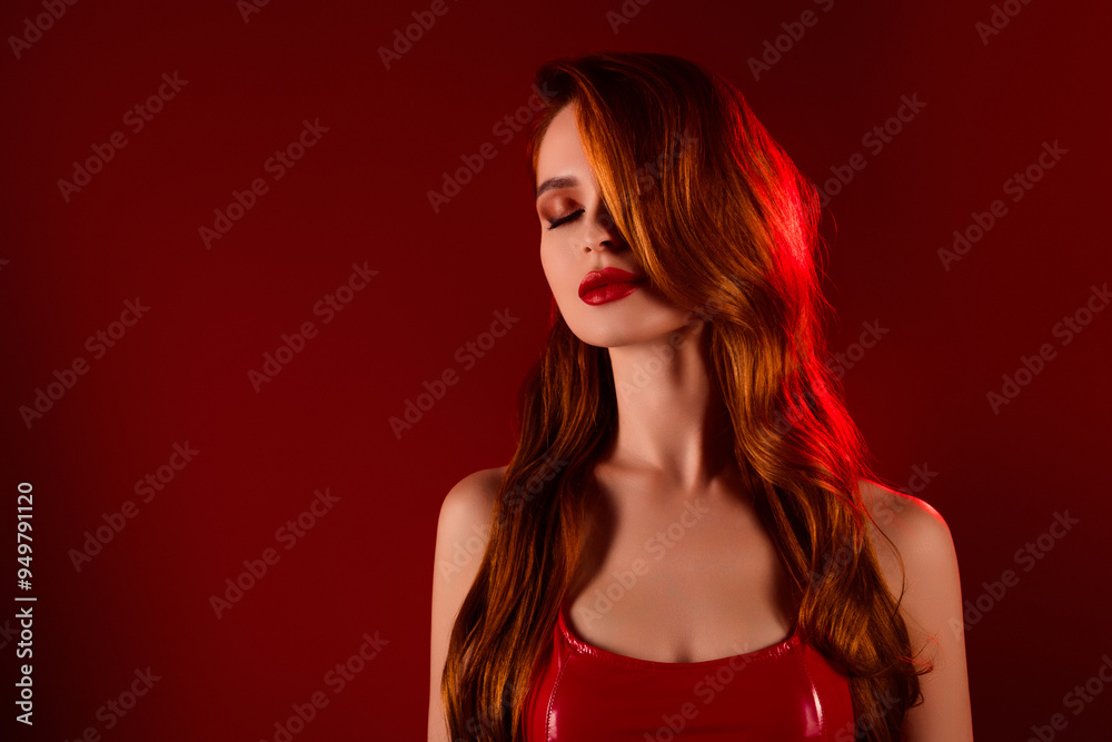 Photo of pretty stunning girl sensual model closed eyes wear sexy leather outfit isolated on red color background Photo of pretty stunning girl sensual model closed eyes wear sexy leather outfit isolated on red color background