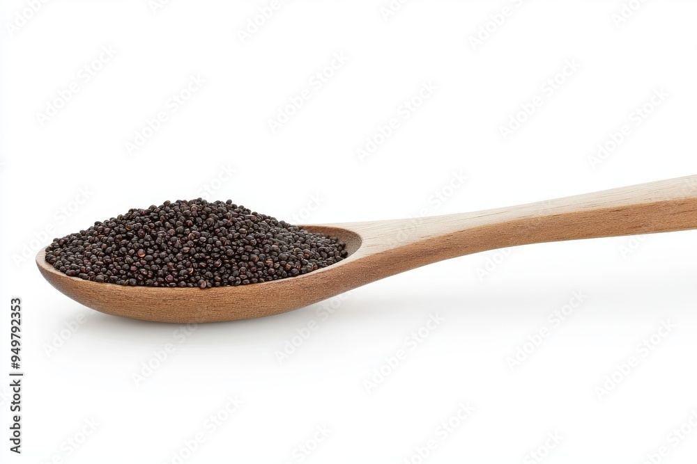 Here's a wooden spoon filled with poppy seeds, ready for cooking. Here's a wooden spoon filled with poppy seeds, ready for cooking.
