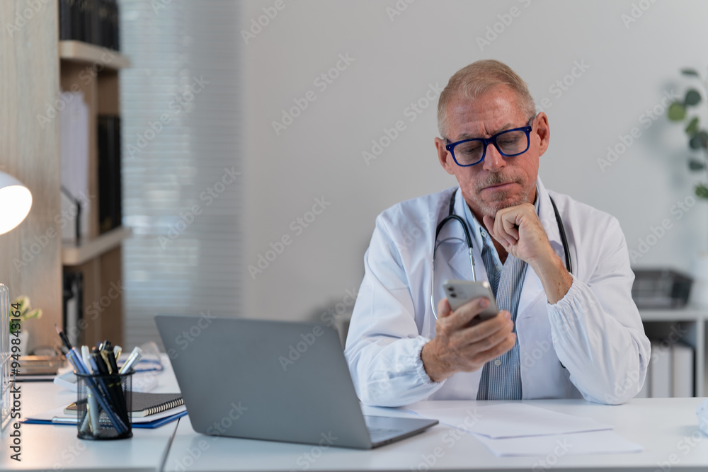 the doctor work with laptop at table in clinic. Online consultation the doctor work with laptop at table in clinic. Online consultation