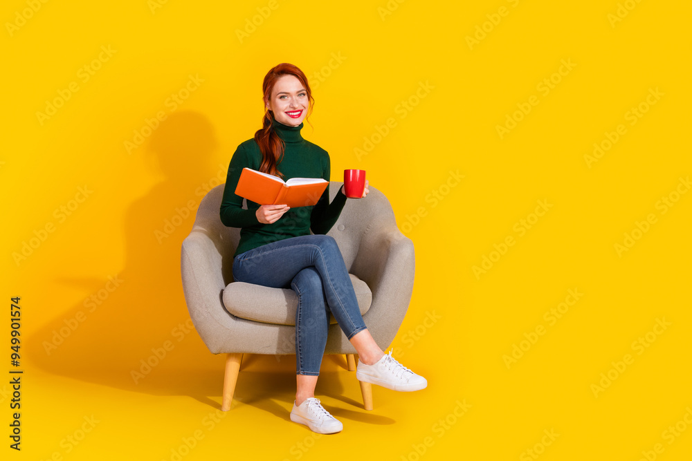 Full length photo of shiny attractive lady dressed green sweater relaxing chair enjoy story drink tea empty space isolated yellow color background Full length photo of shiny attractive lady dressed green sweater relaxing chair enjoy story drink tea empty space isolated yellow color background