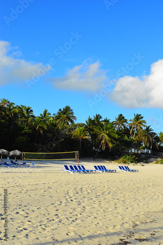 Varadero, CUBA - April 08, 2023: Varadero Beach.The famous beach of Varadero in Cuba with a calm turquoise ocean and clouds in the sky. Sunset time