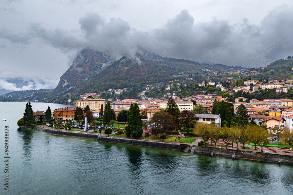 Naklejka premium Menaggio resort town on Lake Como, from above on a cloudy day. Historical buildings and landscapes