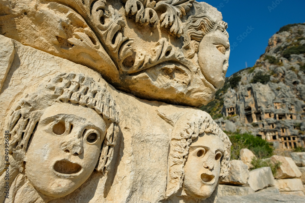 Stone faces in the ruins of Myra Ancient City in Demre, Turkey. Stone faces in the ruins of Myra Ancient City in Demre, Turkey.