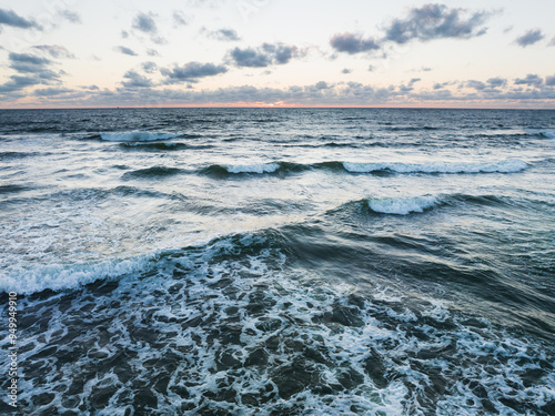 Фотография The Baltic Sea after sunset during an approaching storm, drone view