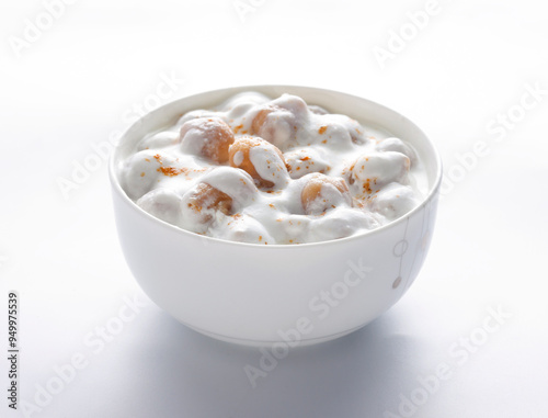 Dahi Boondi is a delicious side line dish. Soft and creamy gram flour dumplings added in yogurt.