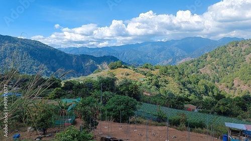 Buguias is a municipality located in the province of Benguet, Philippines. It is known for its cool climate, stunning mountainous landscapes, and as one of the country's leading vegetable-producing. photo