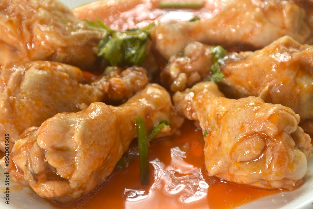 steamed chicken drumstick with sweet red gravy sauce on plate steamed chicken drumstick with sweet red gravy sauce on plate
