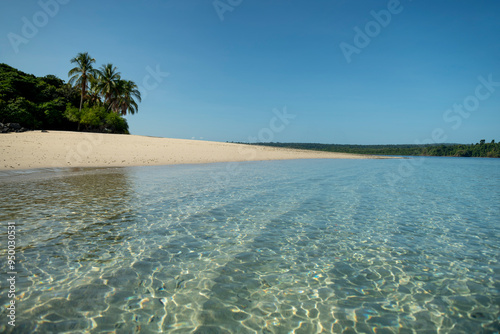 Beautiful, untouched natural blue - turquoise green lagoon and natural beach in the Coiba island national park, Veraguas, Panama - stock photo photo