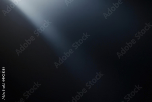 Diagonal light beam crossing dark background creating dramatic effect for black friday advertisement photo