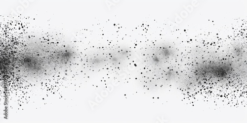 A black and white photo of a white background with a lot of black dots. The dots are scattered all over the background, creating a sense of chaos and disorder. The photo is abstract and has a moody