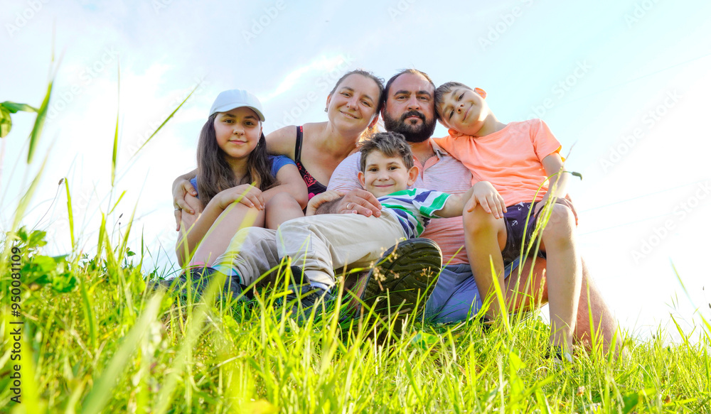 Happy family enjoying together in summer day Happy family enjoying together in summer day
