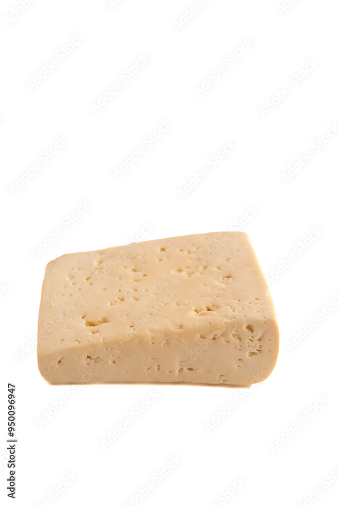 Piece of cheese isolated on a white background. Piece of cheese isolated on a white background.