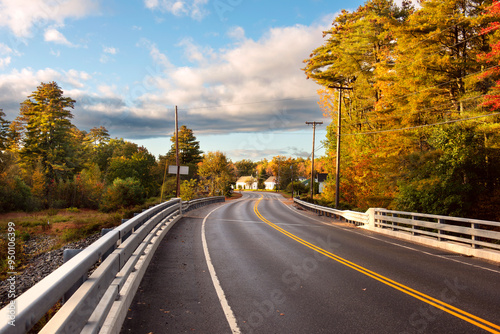 Fototapeta Naklejka Na Ścianę i Meble -  desert paved road among beautiful autumn landscape and small town. USA.