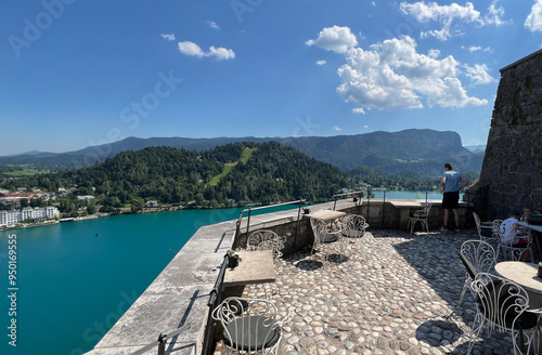 Panoramic view of Bled settlement and on Lake Bled (Blejsko jezero, Bleder See oder Veldeser See) from the castle of Bled (Blejski grad) - Bled, Slovenia photo