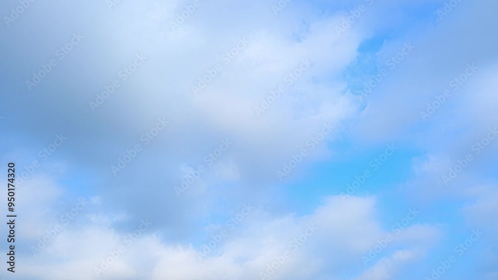 Dynamic time-lapse reveals the atmospheric dance: stratocumulus clouds morph and migrate across the cerulean canvas, driven by unseen forces of wind and weather. Timelapse. Cloudscape background.
Dynamic time-lapse reveals the atmospheric dance: stratocumulus clouds morph and migrate across the cerulean canvas, driven by unseen forces of wind and weather. Timelapse. Cloudscape background.