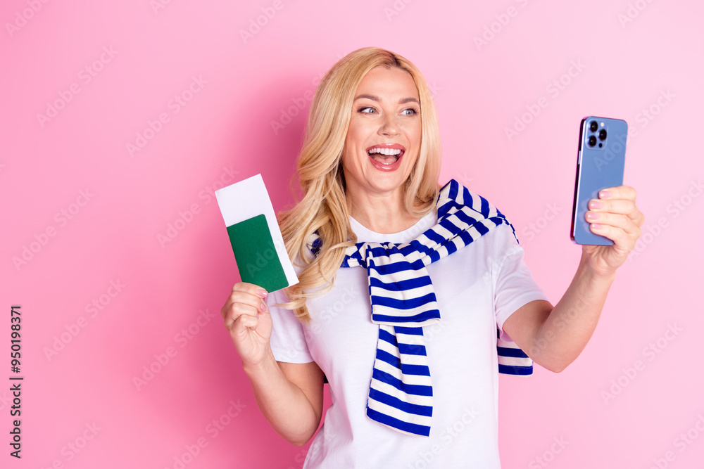 Photo portrait of lovely young lady hold tickets take selfie photo dressed stylish white garment isolated on pink color background Photo portrait of lovely young lady hold tickets take selfie photo dressed stylish white garment isolated on pink color background