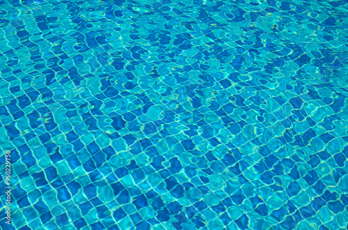 Blue water surface viewed from above in outdoor , sun reflection, dimply photo