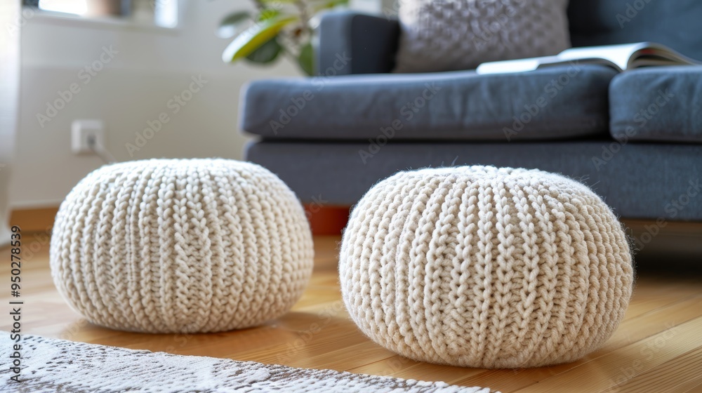 Cozy scandinavian living room with two knitted poufs and a dark blue corner sofa design Cozy scandinavian living room with two knitted poufs and a dark blue corner sofa design
