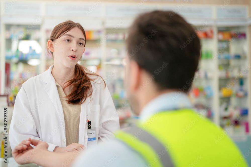 Fototapeta premium pharmacist engages with a customer offering guidance on medication usage. emphasizes the critical role of pharmacists in ensuring patient engineer worker safety and delivering personalized healthcare.