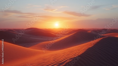 Sunset casting warm light over vast, rippling sand dunes in a peaceful desert landscape.