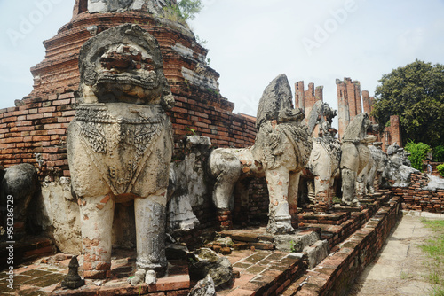 Singha or lion statues around the Main pagoda at Wat Thammickarat deteriorated over time But it also shows the grandeur and indicates the ancient architecture of the Ayutthaya period as well. 