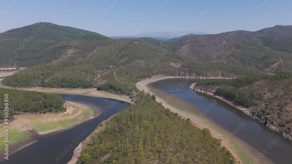 Drone view of the Melero meander in Caceres, Spain. Nature, meander, biodiversity Drone view of the Melero meander in Caceres, Spain. Nature, meander, biodiversity