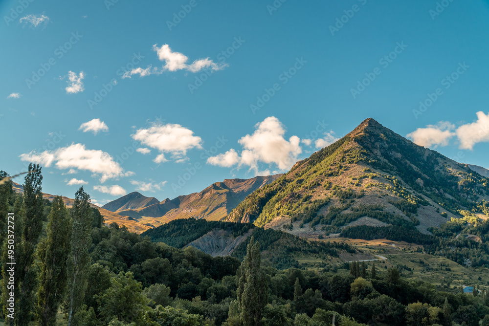 Sunrise in the mountains, blue sky with clouds, in the Pyrenees, Huesca (Spain). Sunrise in the mountains, blue sky with clouds, in the Pyrenees, Huesca (Spain).