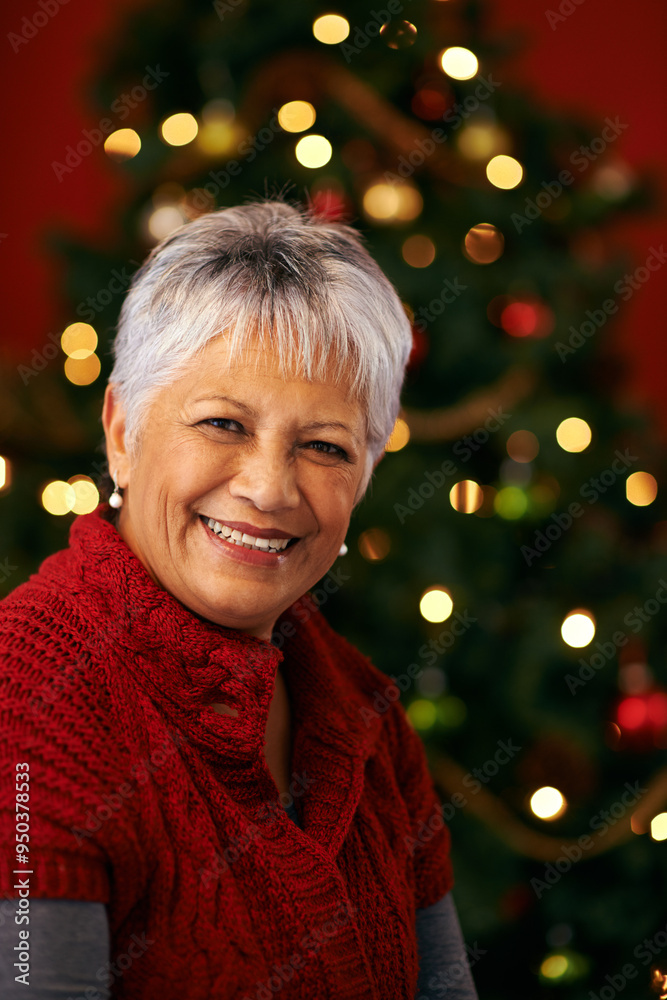Christmas, senior and portrait of happy woman in home for holiday celebration by tree with light bokeh. Xmas, face and smile of mature female person in house for festive season or party in Brazil