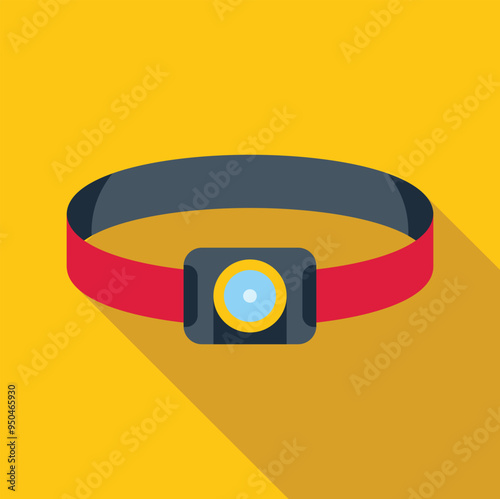 Red headlamp is laying on a bright yellow background, illuminating the dark