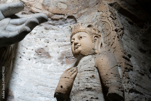 giant stone buddha in Yungang Grottoes in Datong, China photo