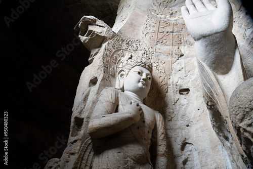 giant stone buddha in Yungang Grottoes in Datong, China photo