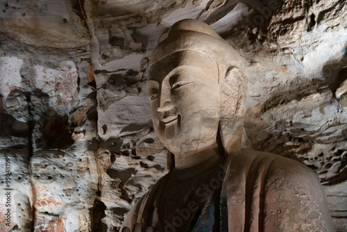giant stone buddha in Yungang Grottoes in Datong, China photo