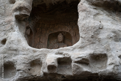 great stone buddhas in Yungang grottoes in Datong,  China photo