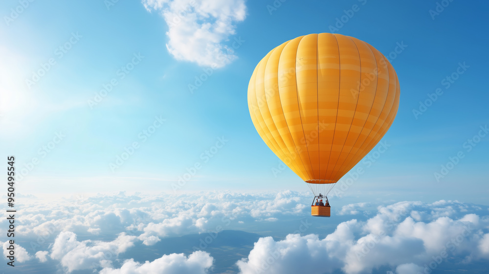 Fototapeta premium Bright yellow hot air balloon floating above the clouds