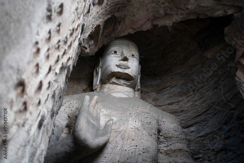 great stone buddhas in Yungang grottoes in Datong,  China photo