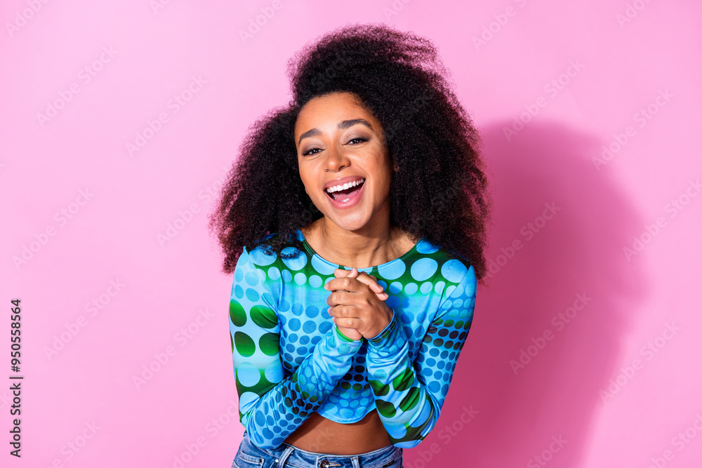 Photo portrait of pretty young girl charming laugh hands together admire wear trendy blue outfit isolated on pink color background Photo portrait of pretty young girl charming laugh hands together admire wear trendy blue outfit isolated on pink color background