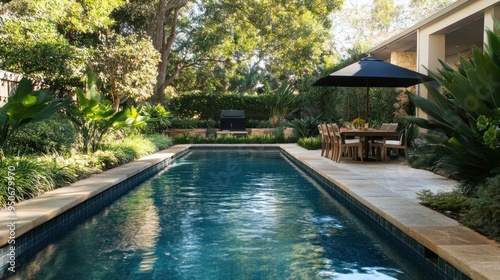 Wallpaper Mural Tranquil Backyard Oasis with Pool and Patio Torontodigital.ca