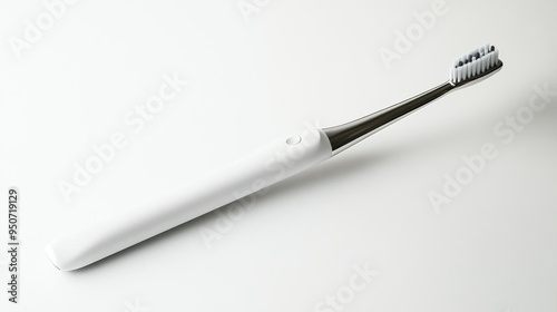 White Electric Toothbrush with Silver Trim and Bristles