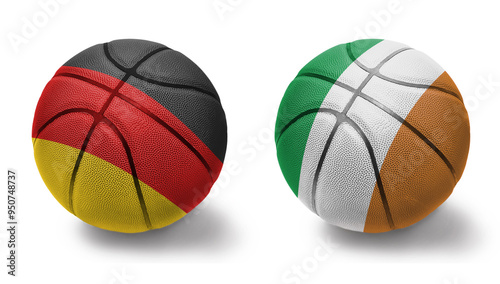 basketball balls with the national flags of ireland and germany on the white background. photo