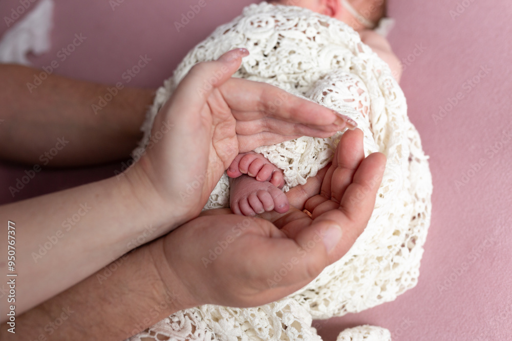 feet in parents hands on white background. newborn baby foot feet in parents hands on white background. newborn baby foot
