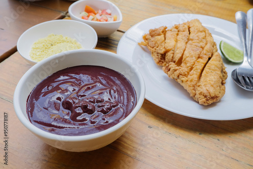 Açaí com peixe frito servido em restaurante | Belém, Brasil photo