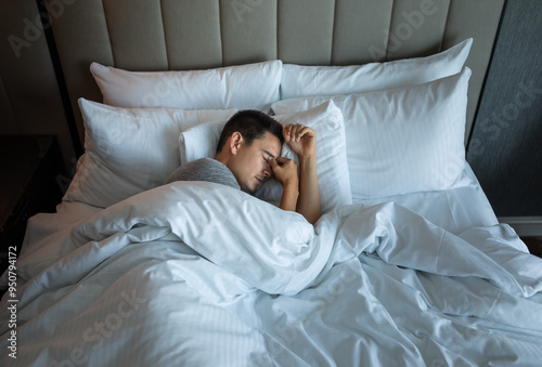 Exhausted man can't sleep, people having trouble sleeping waking up tired 
