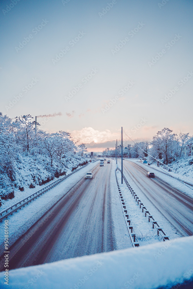 Two Lanes of a Autobahn Highway Covered with Ice and Snow on a Beautiful Morning
