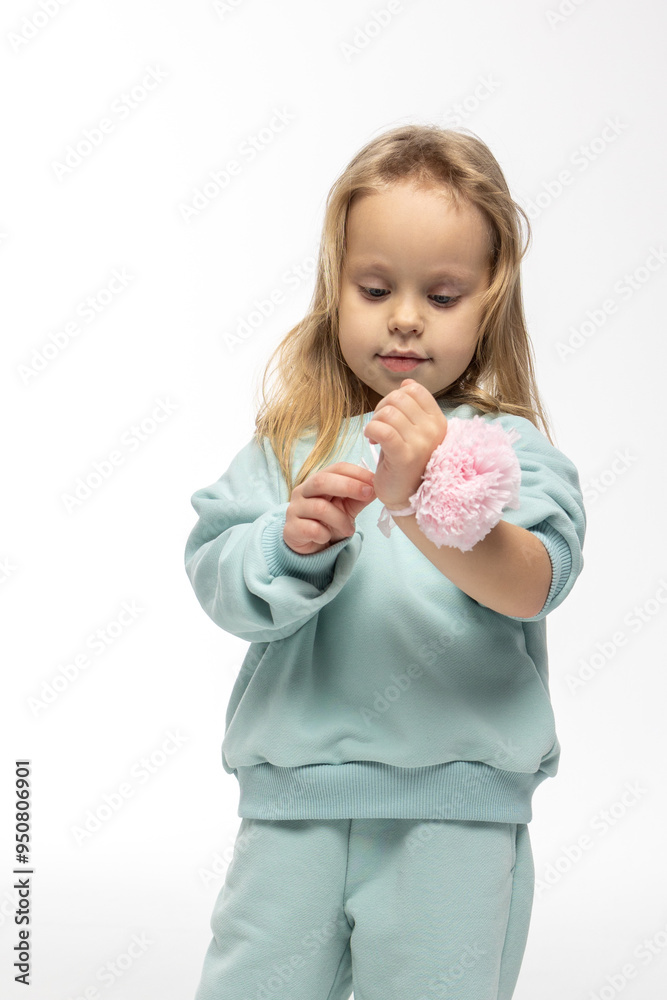 Portrait of beautiful cute little toddler girl. Child with funny face in mint sweatshirt. Pretty smile kid in studio on white background. High quality photo Portrait of beautiful cute little toddler girl. Child with funny face in mint sweatshirt. Pretty smile kid in studio on white background. High quality photo