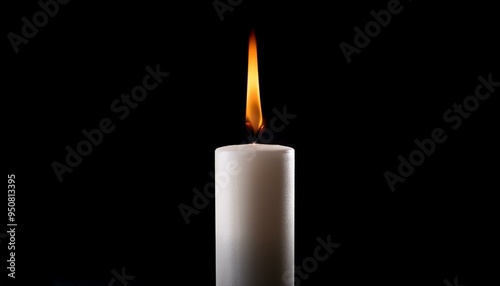 Close up single candle light and flame on black background 