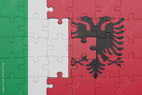 Fototapeta Naklejka Na Ścianę i Meble -  puzzle with the colourful national flag of albania and flag of italy .