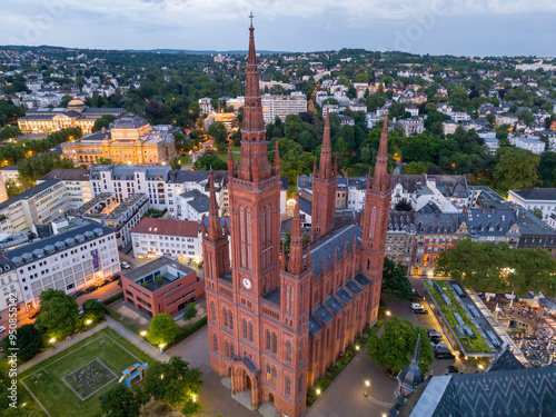 Obraz na płótnie Aerial Drone Shot of Cathedral at Marktkirche in Wiesbaden, Germany. Old town and the city center at Evening Twilight. w salonie